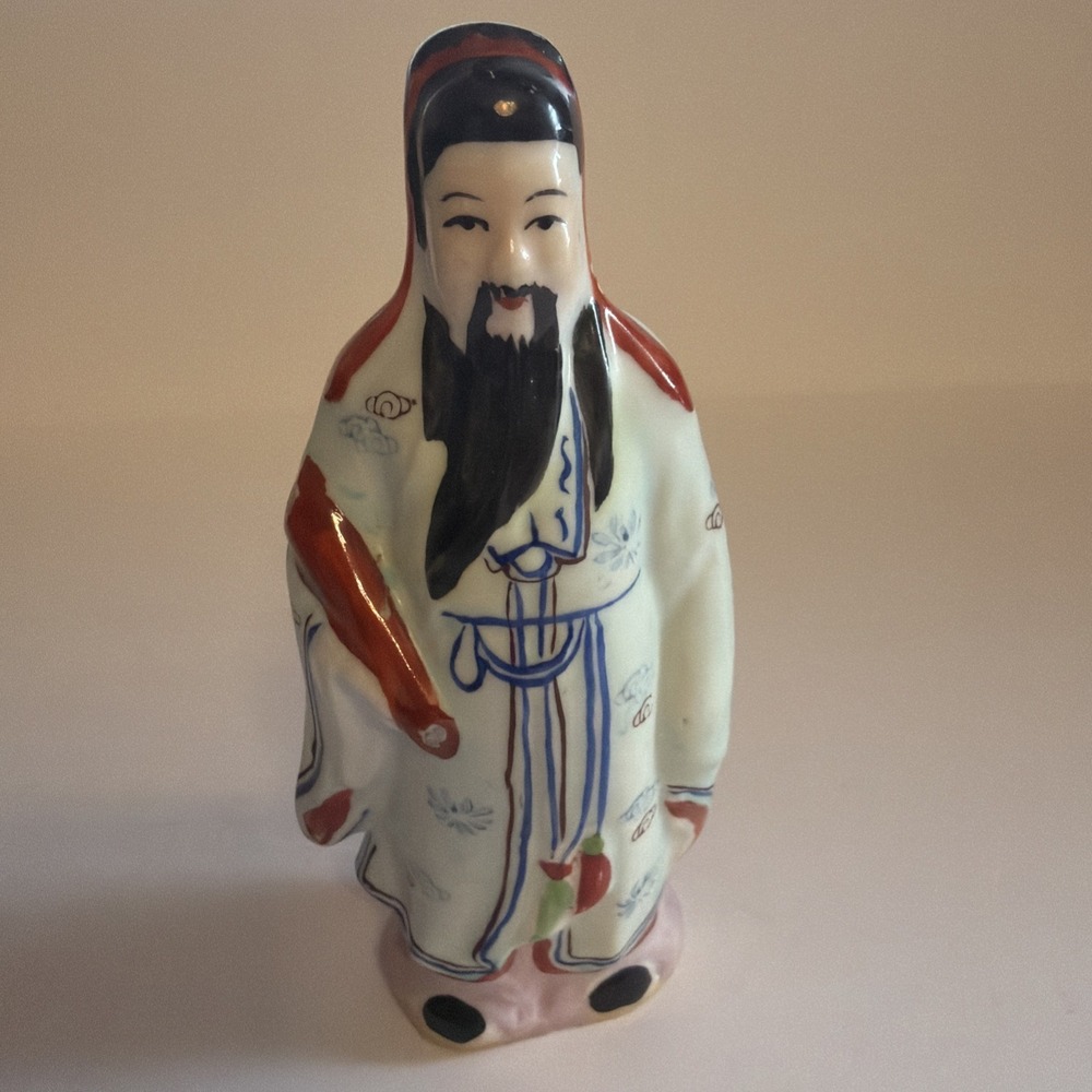 VINTAGE ORIENTAL PORCELAIN  FIGURINE MAN IN THE BLUE ROBE